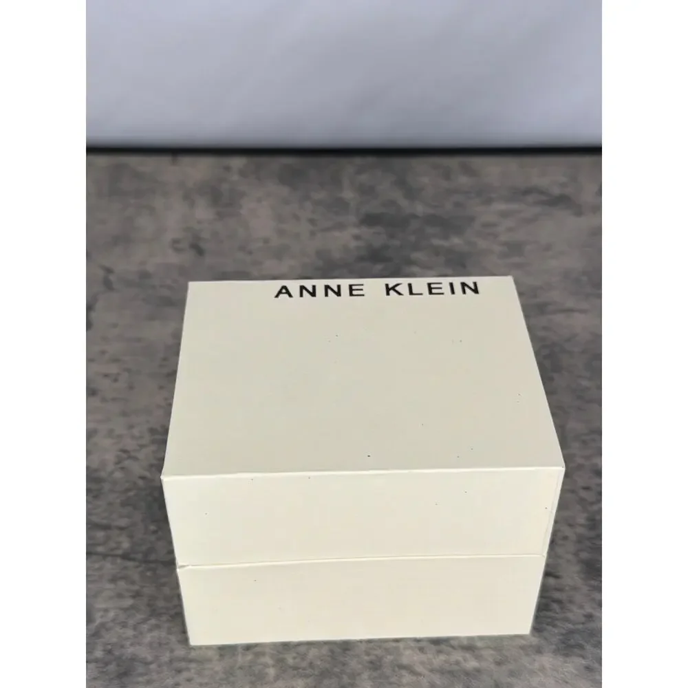 Anne Klein Women's Genuine Diamond Dial Bangle Watch- Rose Gold